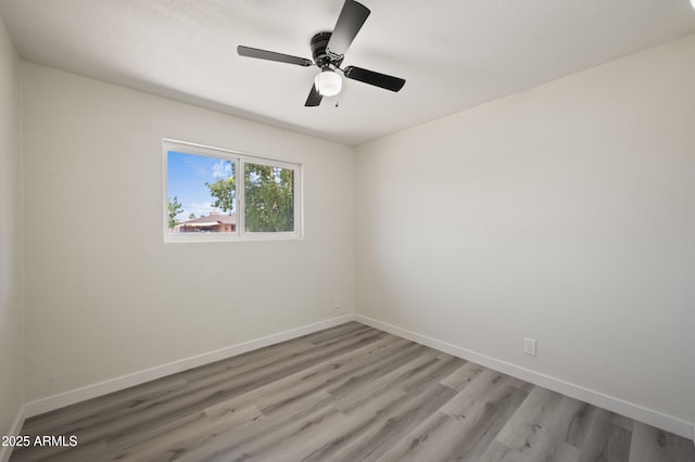 1427 W 6th Dr, Mesa, AZ 85202 - unfurnished room with light wood-style floors and ceiling fan