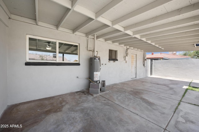 1427 W 6th Dr, Mesa, AZ 85202 - view of patio / terrace with gas water heater and a carport