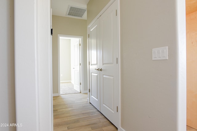 corridor featuring light wood-type flooring