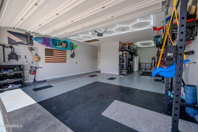 garage featuring baseboards