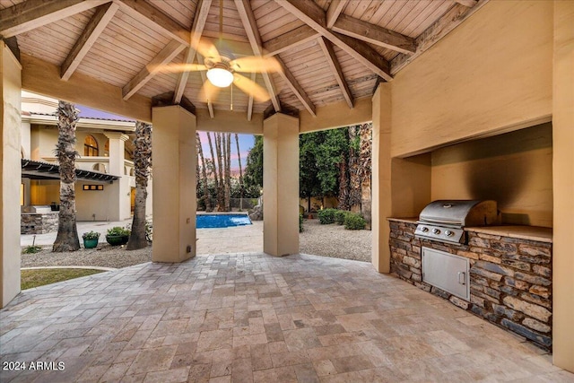 view of patio / terrace featuring a gazebo, area for grilling, ceiling fan, and grilling area