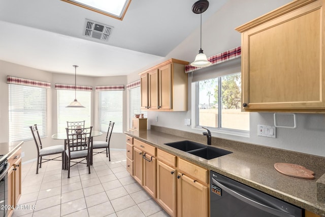 kitchen featuring pendant lighting, sink, light tile patterned floors, and stainless steel appliances