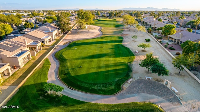 birds eye view of property with a mountain view