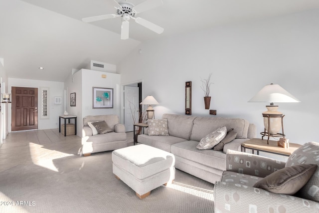 living room featuring ceiling fan and lofted ceiling