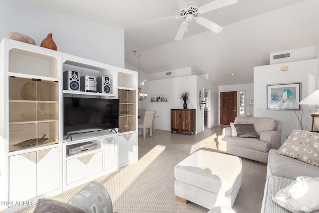 living room featuring ceiling fan and lofted ceiling