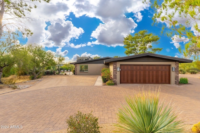 view of front of property featuring a garage