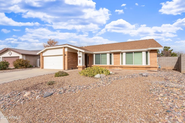 ranch-style house featuring a garage