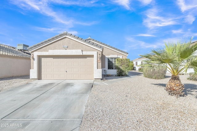 5769 E Good Pasture Ln, Florence, AZ 85132 - ranch-style house featuring stucco siding, concrete driveway, and an attached garage