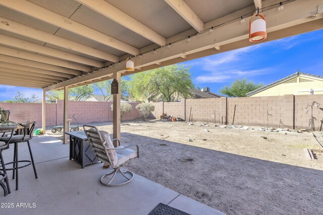 5769 E Good Pasture Ln, Florence, AZ 85132 - fenced backyard with a patio