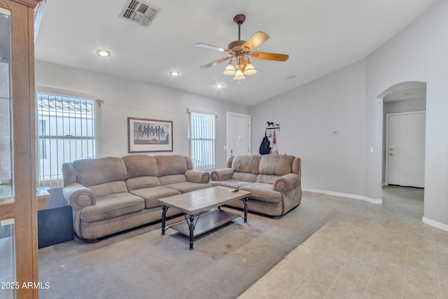 5769 E Good Pasture Ln, Florence, AZ 85132 - living area featuring arched walkways, a ceiling fan, vaulted ceiling, recessed lighting, and light tile patterned flooring