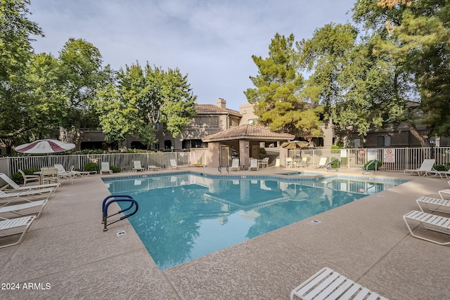 view of pool featuring a gazebo and a patio area