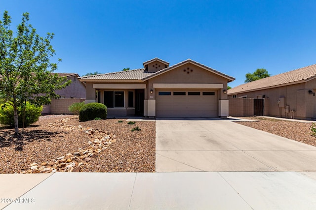 3719 E Sandy Way, Gilbert, AZ 85297 - view of front of property with a tile roof, a garage, stucco siding, and concrete driveway