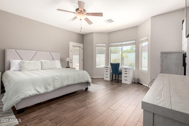 3719 E Sandy Way, Gilbert, AZ 85297 - bedroom with wood finished floors and a ceiling fan