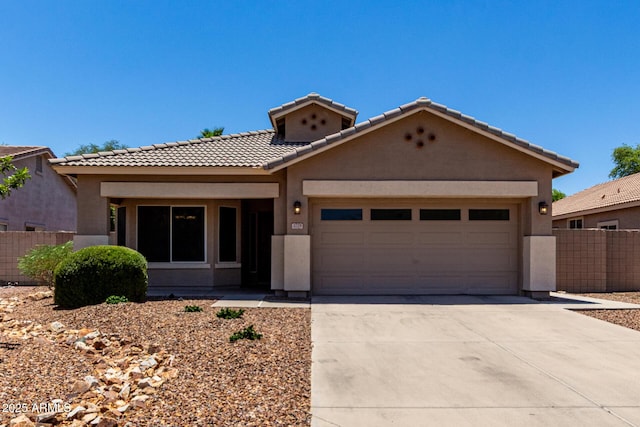 3719 E Sandy Way, Gilbert, AZ 85297 - view of front of house featuring stucco siding, a tiled roof, concrete driveway, and an attached garage