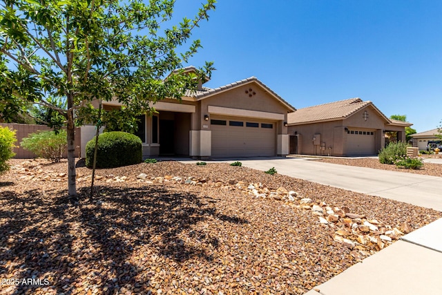 3719 E Sandy Way, Gilbert, AZ 85297 - view of front of house with a garage, stucco siding, concrete driveway, and a tiled roof