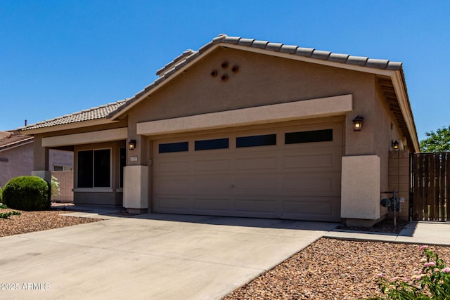 3719 E Sandy Way, Gilbert, AZ 85297 - view of front facade featuring stucco siding, an attached garage, concrete driveway, and a tile roof