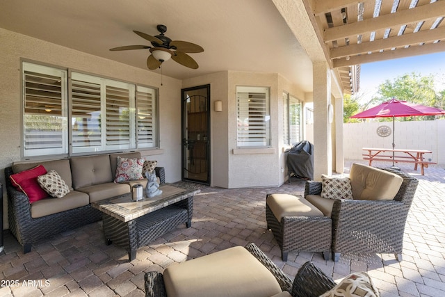 view of patio / terrace with a grill, an outdoor hangout area, and ceiling fan