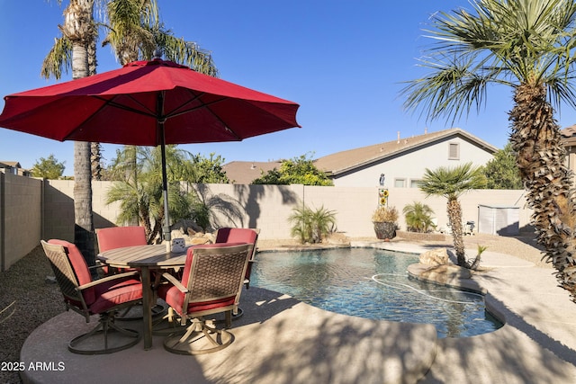 view of swimming pool featuring a patio and pool water feature