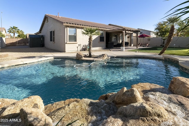 view of swimming pool with a patio