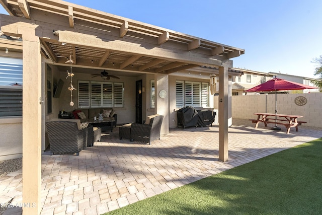 view of patio with an outdoor living space, a grill, and ceiling fan