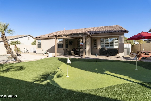 back of house featuring a patio area