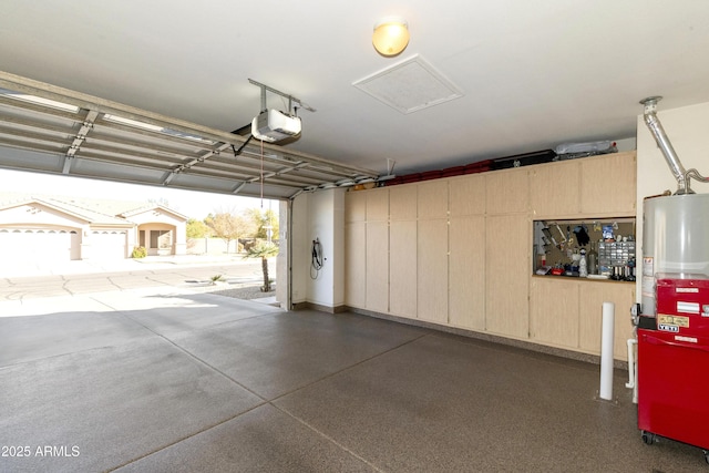 garage with a garage door opener and heating unit