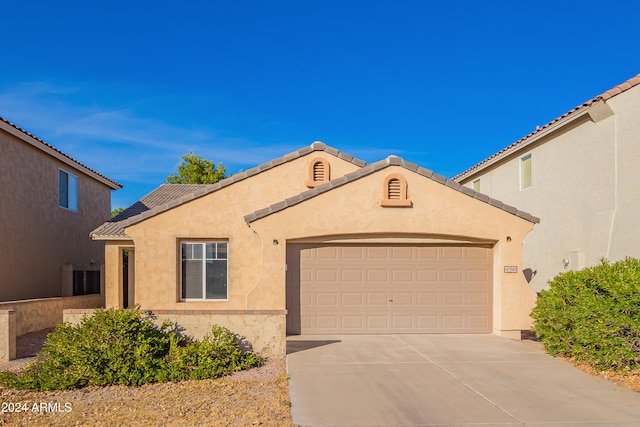 view of front of home featuring a garage