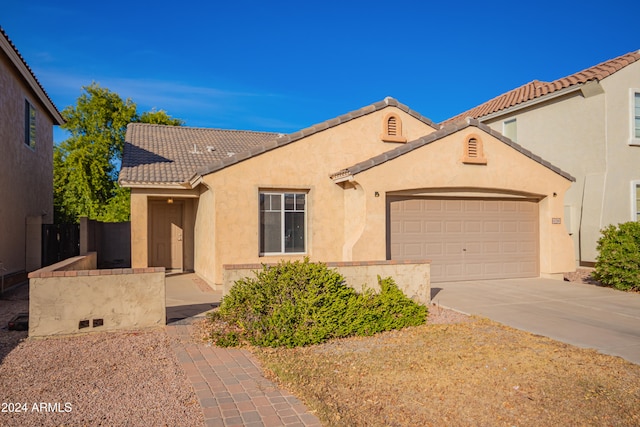 view of front of property featuring a garage