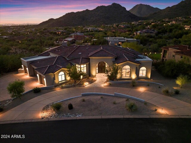 mediterranean / spanish-style house with a mountain view