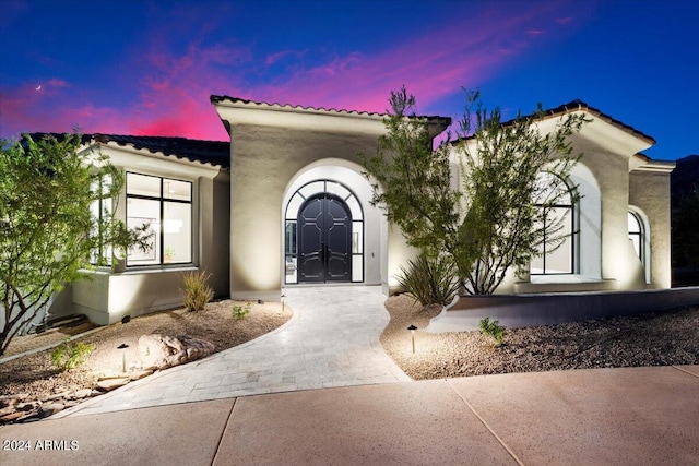 mediterranean / spanish house with french doors