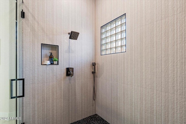 bathroom with an enclosed shower