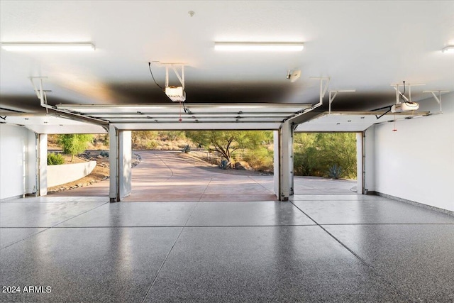 garage featuring a garage door opener