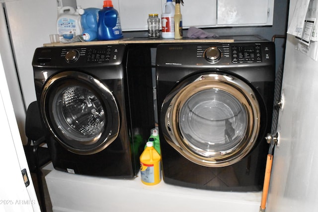 laundry area featuring laundry area and separate washer and dryer