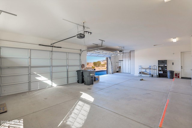 garage featuring a garage door opener