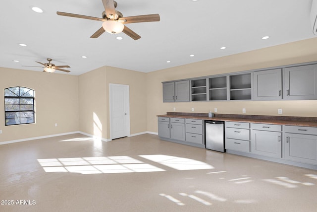 kitchen with fridge, ceiling fan, and gray cabinets