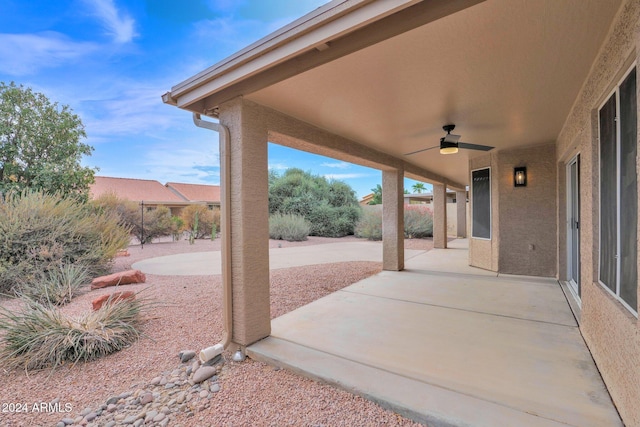 view of patio / terrace featuring ceiling fan