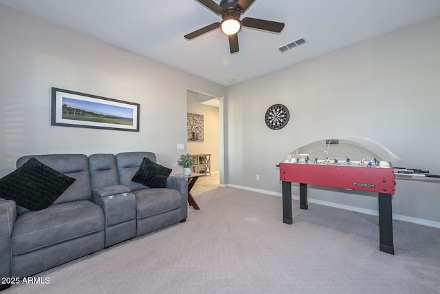 rec room featuring ceiling fan, carpet floors, visible vents, and baseboards