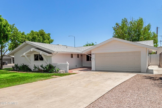 556 S Forest, Mesa, AZ 85204 - single story home with a garage, concrete driveway, and roof with shingles