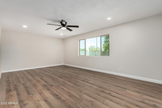 556 S Forest, Mesa, AZ 85204 - unfurnished room with wood finished floors, a ceiling fan, and recessed lighting