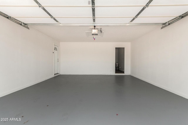 556 S Forest, Mesa, AZ 85204 - garage featuring a garage door opener and baseboards