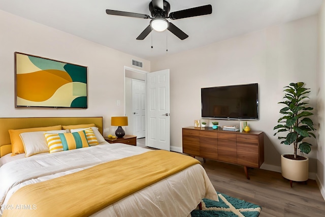556 S Forest, Mesa, AZ 85204 - bedroom featuring wood finished floors and ceiling fan
