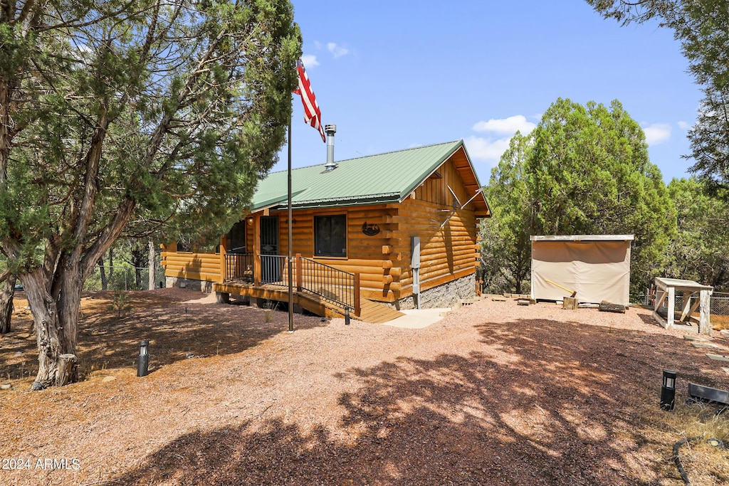 861 S Palomino Way, Payson, AZ 85541 - view of property exterior with log exterior and metal roof