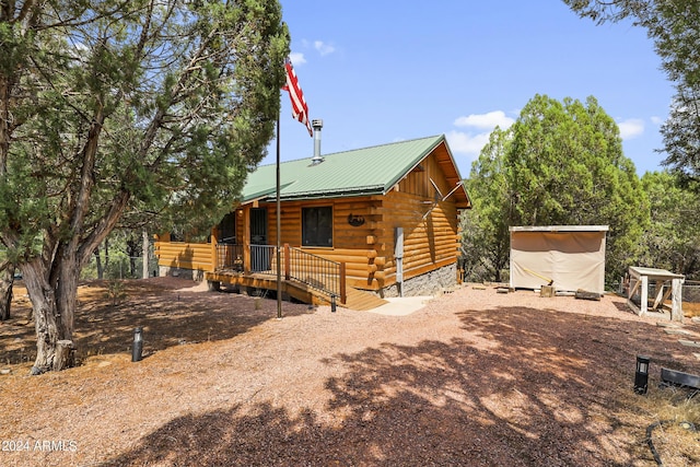861 S Palomino Way, Payson, AZ 85541 - view of property exterior with log exterior and metal roof