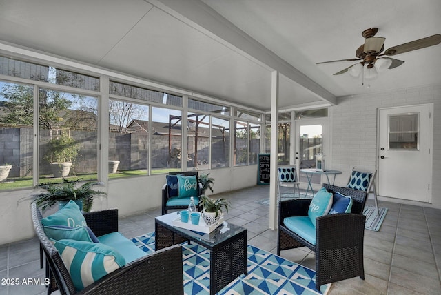 sunroom with an outdoor hangout area and ceiling fan
