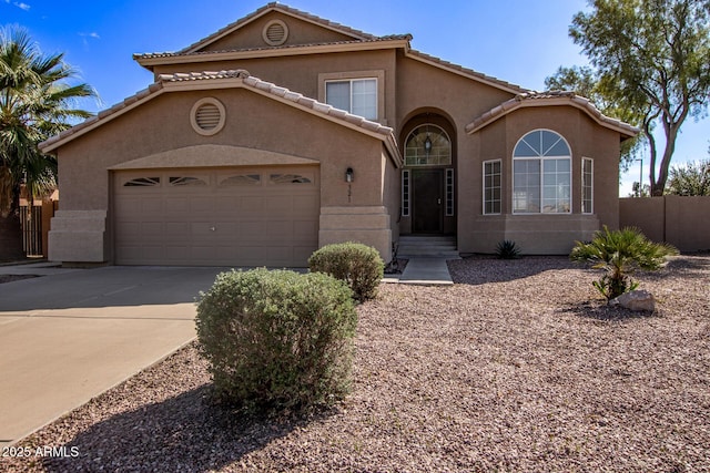 view of front of property featuring a garage