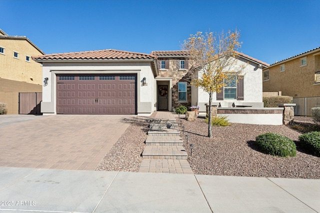 mediterranean / spanish house featuring a garage