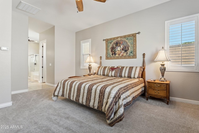 carpeted bedroom with ceiling fan and connected bathroom