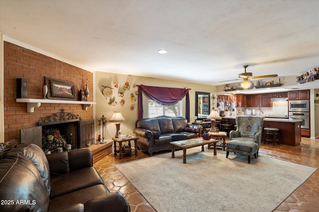 23265 S Via Del Arroyo, Queen Creek, AZ 85142 - living room with ceiling fan and a fireplace