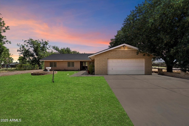 23265 S Via Del Arroyo, Queen Creek, AZ 85142 - ranch-style home with concrete driveway, an attached garage, and brick siding