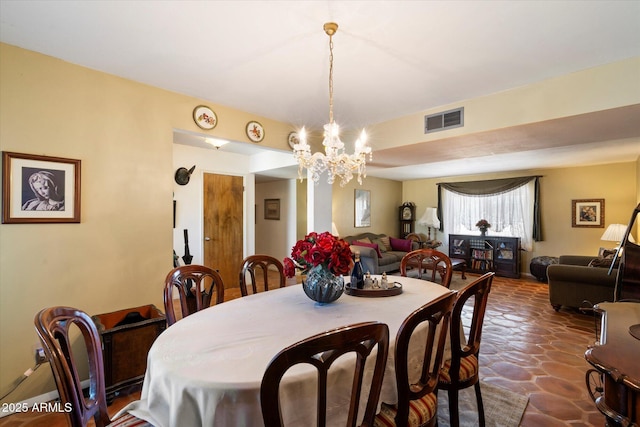 23265 S Via Del Arroyo, Queen Creek, AZ 85142 - dining area featuring a chandelier